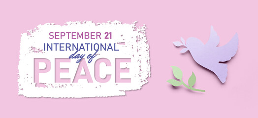 Paper dove and olive branch on pink background. Banner for International Day of Peace