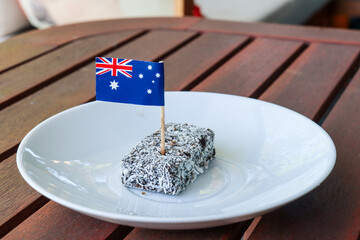 australian flag toothpick on lamington on table in outdoor setting