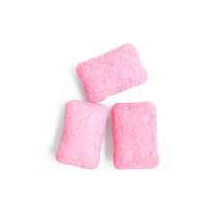 Pink chewing gums on white background