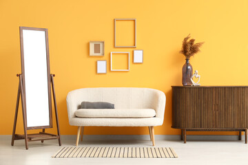 Modern living room interior with white sofa, mirror and cabinet