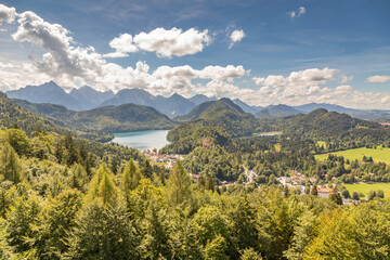 Panoramic View of Alpsee Lake and Green Fields in the Summer, Near Hohenschwangau, Bavaria, Germany - obrazy, fototapety, plakaty