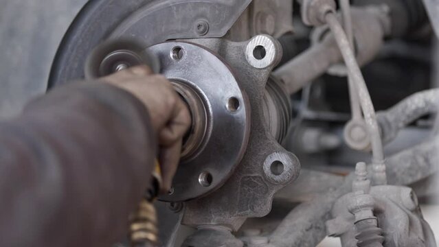 horizontal, workshop, business finance and industry, assistance, examining, factory, failure, car brake disc, sanding, engine, car, metal, machine, wheel, gear, gears, motor, old, mechanical, steel, i