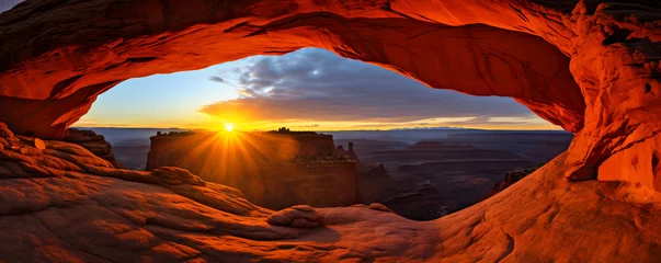 Keuken spatwand met foto A panoramic view of a sunrise framed by the iconic Mesa Arch in Canyonlands National Park © MAJGraphics