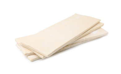 Raw puff pastry dough isolated on white