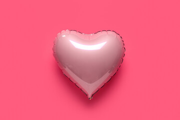Heart shaped air balloon on pink background. Valentine's Day celebration