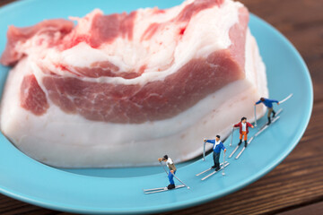 Miniature creative piece of meat skier