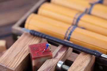 Miniature photo carving figures at work