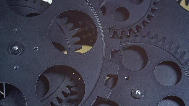 Inefficient Teamwork of Mechanical Gears Working Shakily in Chaos Footage.
