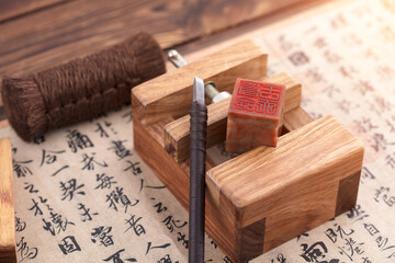 The engraved seal is fixed on the engraving bed