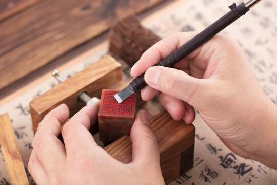 A close-up of traditional seal cutting
