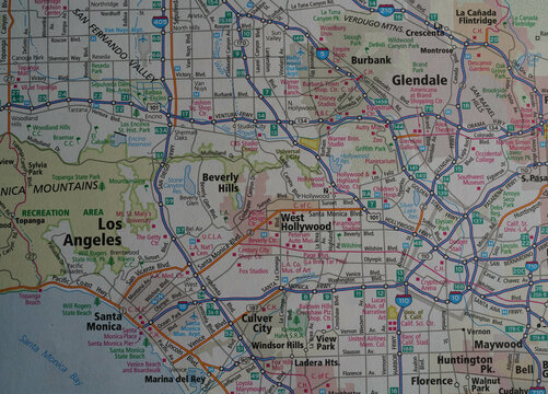 Close-up of a map of the Los Angeles, California metro area on a road atlas. 