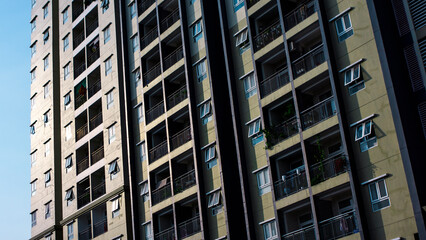 Fototapeta premium Aerial view of illuminated cityscape at night,building forest night, Skyscrapers in city, Full frame shot of building, View of cityscape against sky during sunset