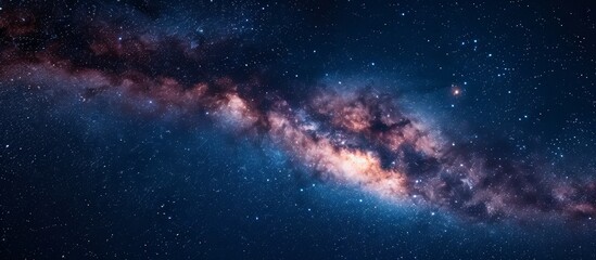 Naklejka premium Starry night sky with Milky Way and numerous stars.
