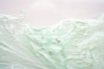 Transparent clear green liquid serum gel cosmetic texture background