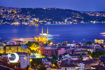 Istanbul, Turkey. View of the mosque Ortakoy, Bosphorus and the city in the evening after sunset