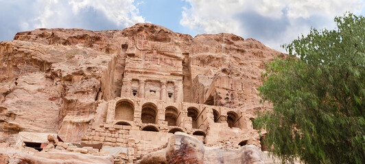 The main fasade of the Great Temple in the Nabatean Kingdom of Petra in the Wadi Musa city in Jordan