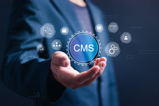 CMS, Content management system concept, Businessman touch virtual screen of content management system icon for business website management.