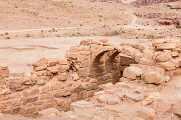 Remains of a side street with an arched ceiling in a Roman city in the Nabataean Kingdom of Petra...