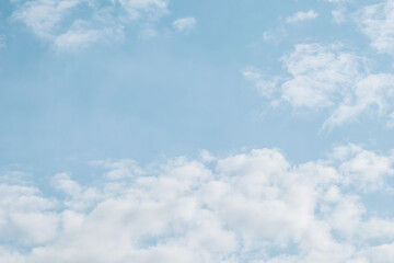 Fototapeta premium Background of blue sky with white clouds