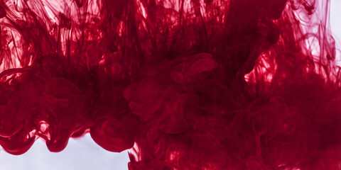 赤いインクが流れ落ちるテクスチャ　AI画像