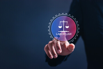 Labor law concept. Businessman touching virtual labor law icon to determine rights and duties...