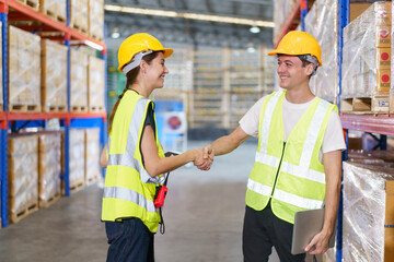 Caucasian male and female warehouse personnel engage in amicable conversation, culminating in a...