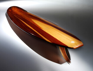 Redwood Surfboard with dramatic lighting