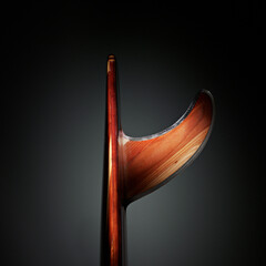 Redwood Surfboard with dramatic lighting