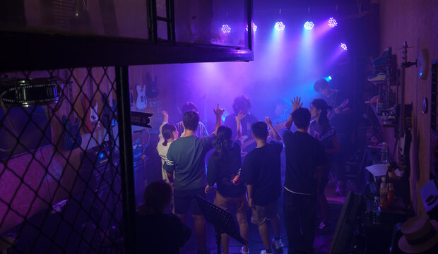 Young band performing on stage