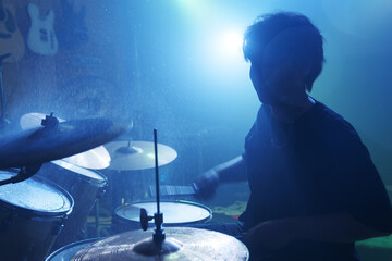 The band drummer performed on stage