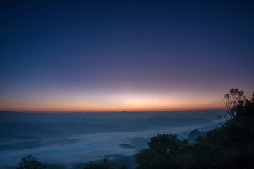 Sea of fog in a valley a sunrise time