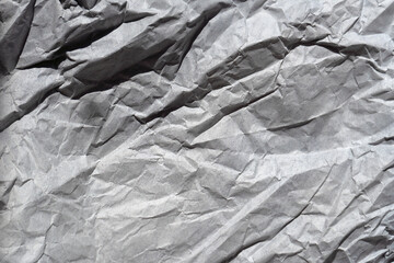 Crumpled kraft paper lies on the surface