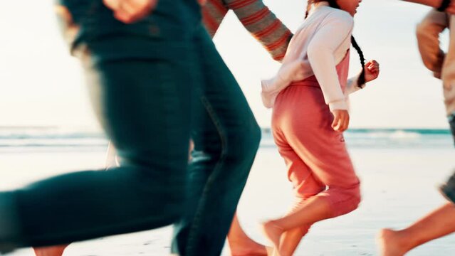 Family, game and running on beach at sunset playing with freedom, happiness and travel on holiday. Summer, vacation and parents bonding, chasing or catch children together on sand for fun adventure
