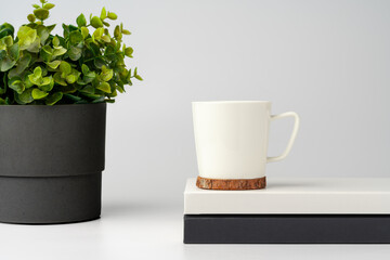 Coffee mug on white office table mock up