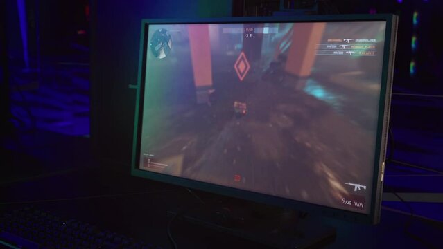 Competing in the pc online game esports tournament. Killing the enemies in the fps pc online game round. Winning the match of the shooter pc online game competition. Victory screen. Multiplayer.