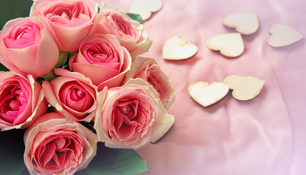 Roses Bouquet and Hearts background. Valentine or Wedding backgrounds, pastel tone selective focus image