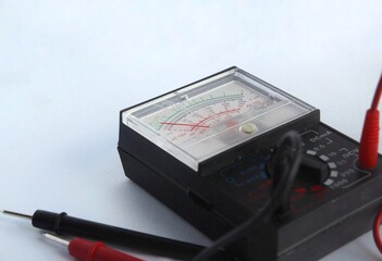 Multimeters are used to test electrical circuits, batteries, and other devices.  close up...