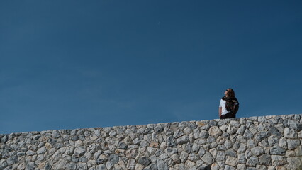 person on top of the mountain