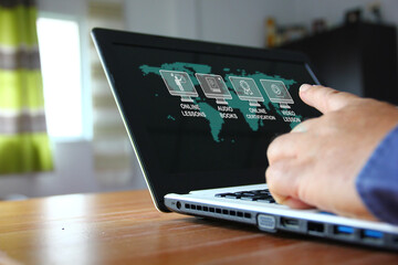 worker develop own potential  using laptop searching e learning service