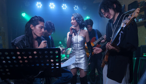 Young band performing on stage