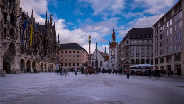 Munich Marienplatz square time lpase, hyperlapse video in 4K, moving lapse in front munich town hall at marienplatz sqaure, frauenkirche and old town hall, munich germany.