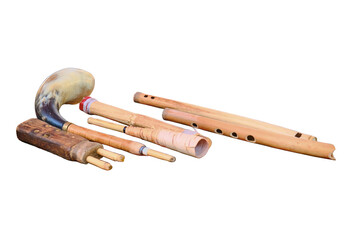 A set of ancient woodwind musical instruments, isolated on a white background. Retro pipes, flutes and horns on the table, lifestyle.