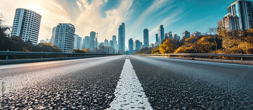 Poster Panoramic skyline and buildings with empty road. Copy space image. Place for adding text or design