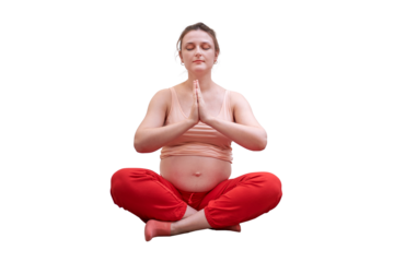 A pregnant woman does sports at home and does exercises in the lotus position, isolated on a white background