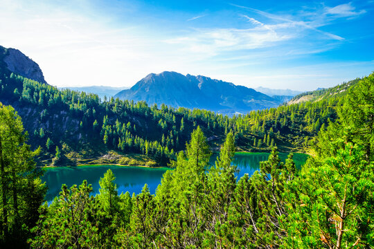 Nature on the high plateau of the Tauplitzalm. View of the landscape at the Toten Gebirge in Styria. Idyllic surroundings with mountains and green nature on the Tauplitz in Austria.
