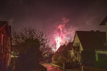 Naklejka na ściany i meble Pfaffenhofen Silvester fireworks with dust and fog background