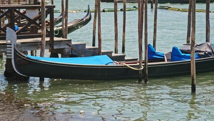 Traditional Venice Canal Gondola Boat Moored at Pier