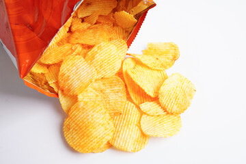 Potato chips in open bag, delicious BBQ seasoning spicy for crips, thin slice deep fried snack fast food.