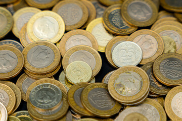 stacked many coins Turkish lira wtih 5 kurus on foreground