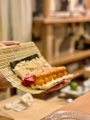 Tuna, sea ​​urchin, egg yolk sushi roll